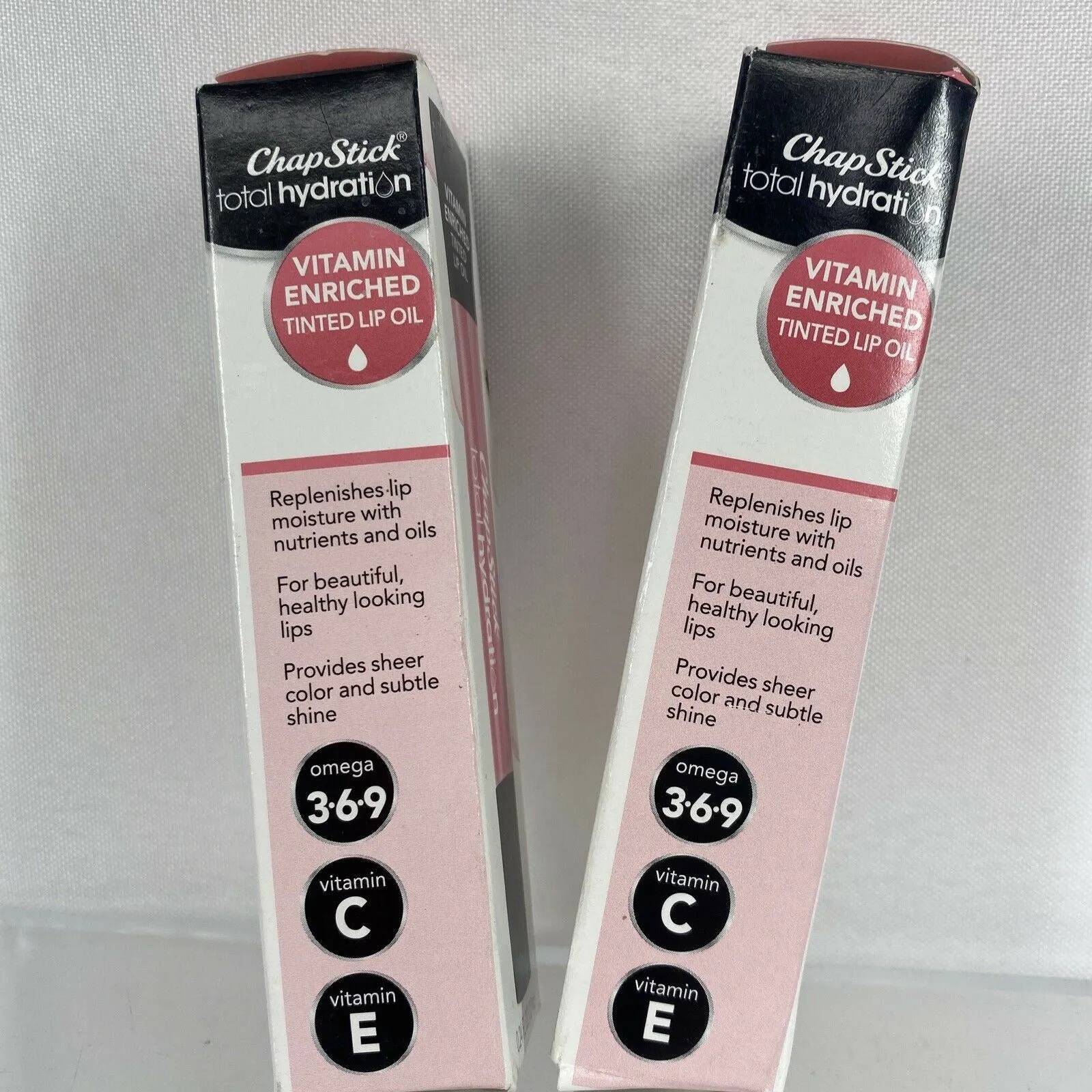 (2) Warm pink￼ Chapstick Total Hydration Vitamin Tinted Lip Oil￼ .24oz