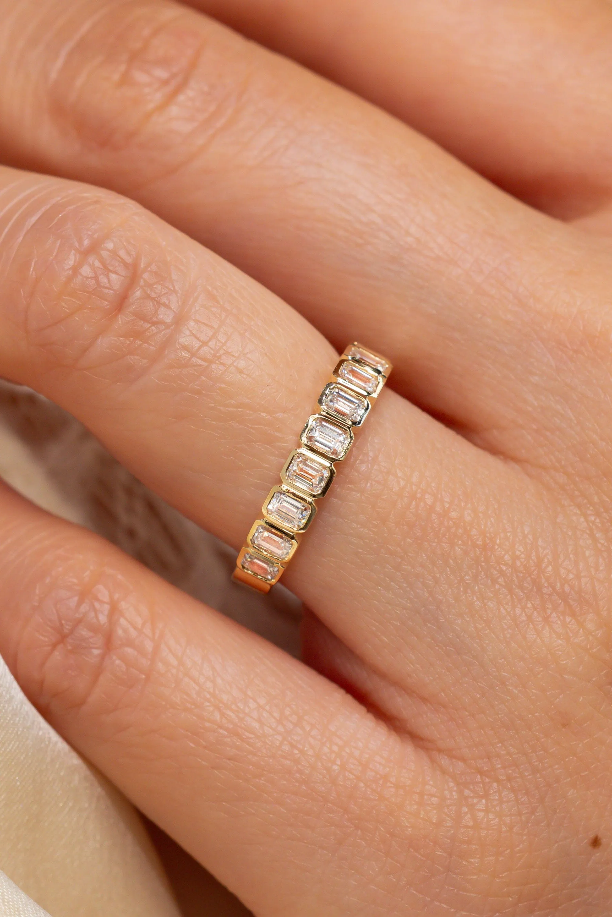 North-South Emerald Bezel Diamond Ring