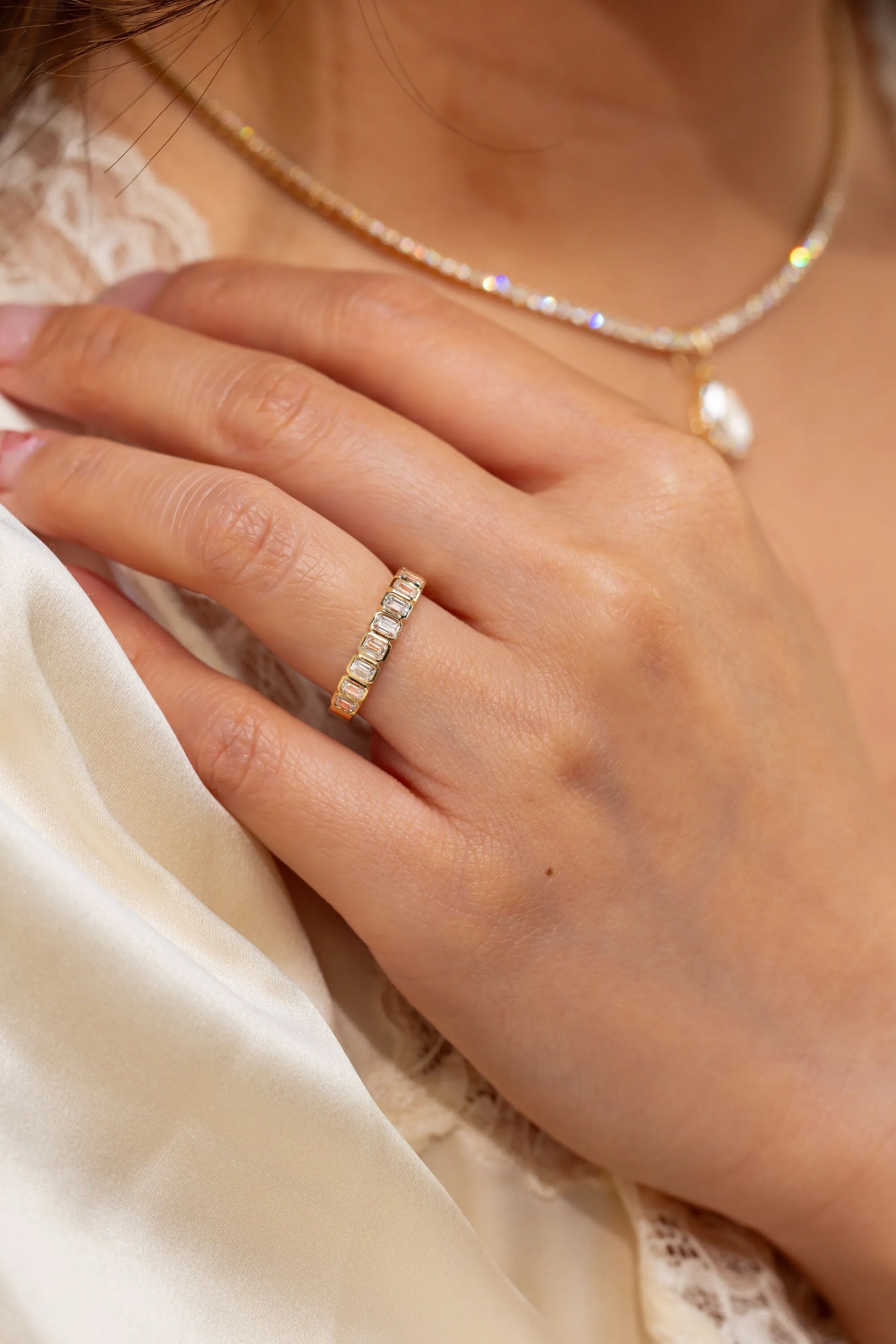 North-South Emerald Bezel Diamond Ring