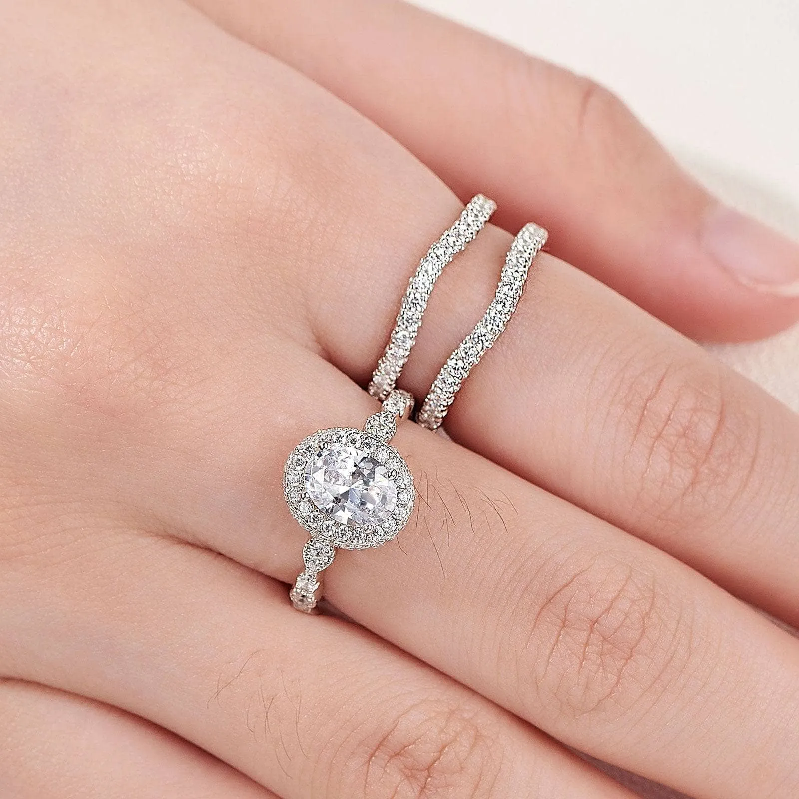 Oval Cut Diamond Halo Engagement Ring Set