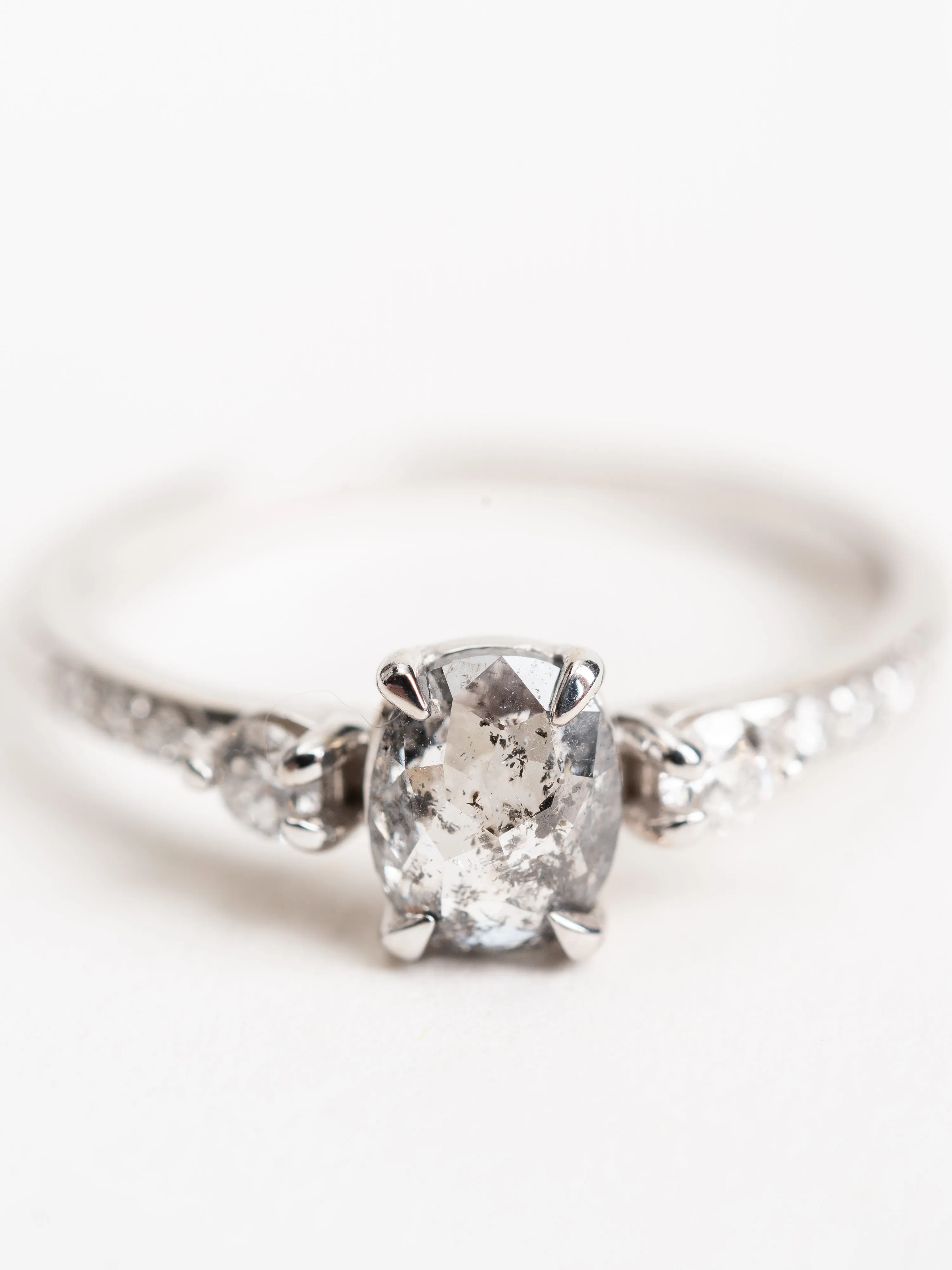 salt & pepper oval diamond with eliza setting