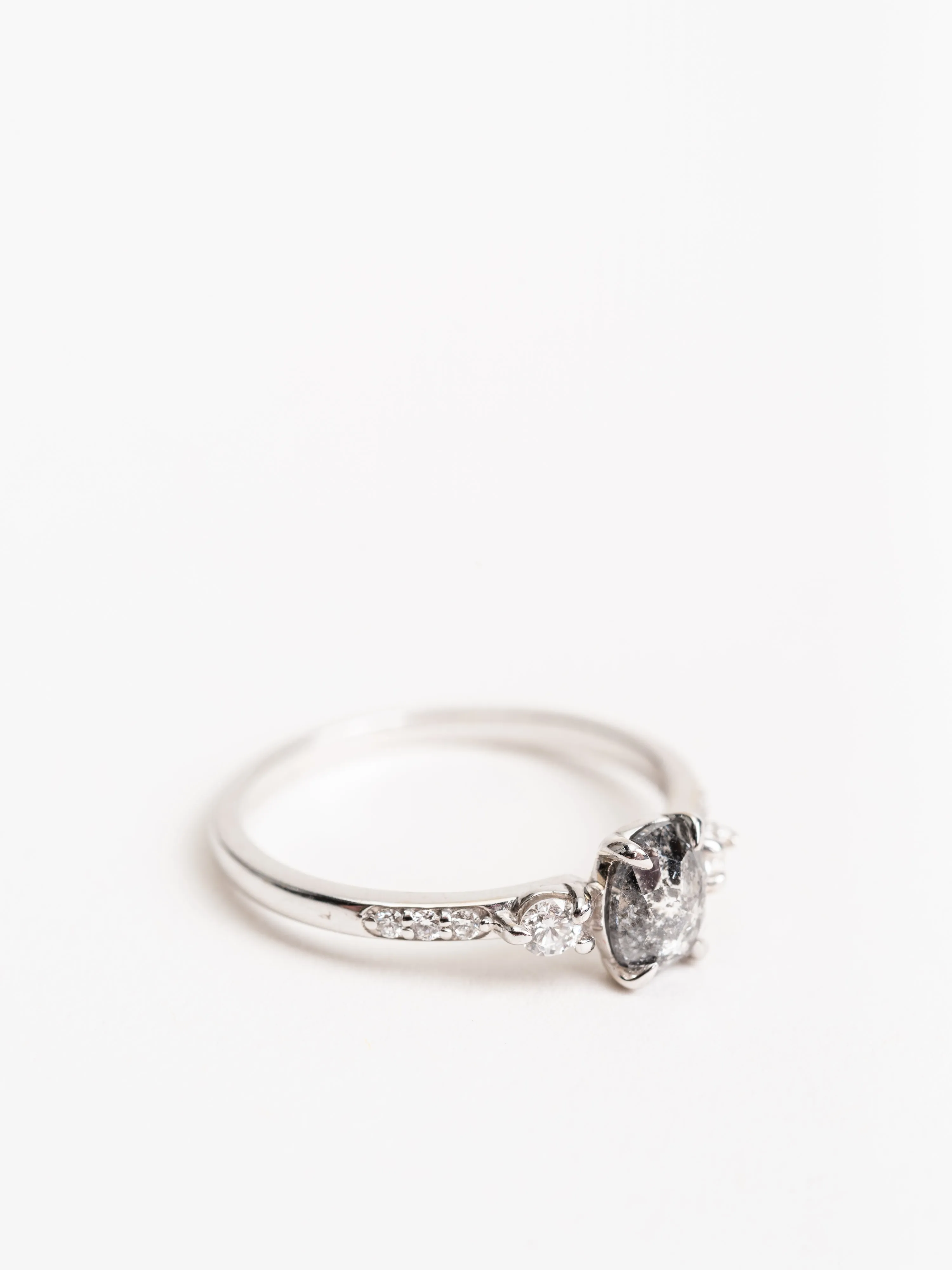 salt & pepper oval diamond with eliza setting