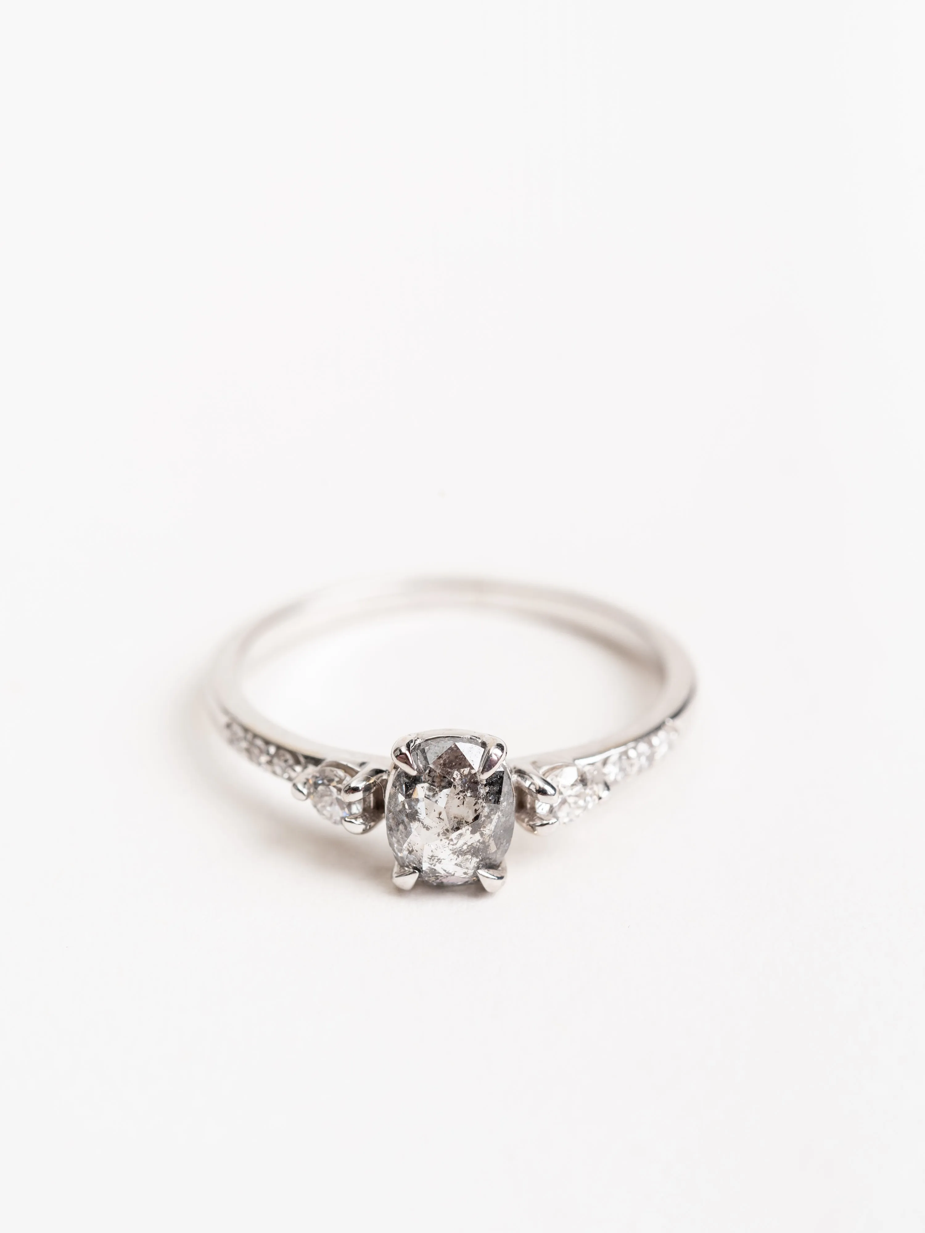salt & pepper oval diamond with eliza setting