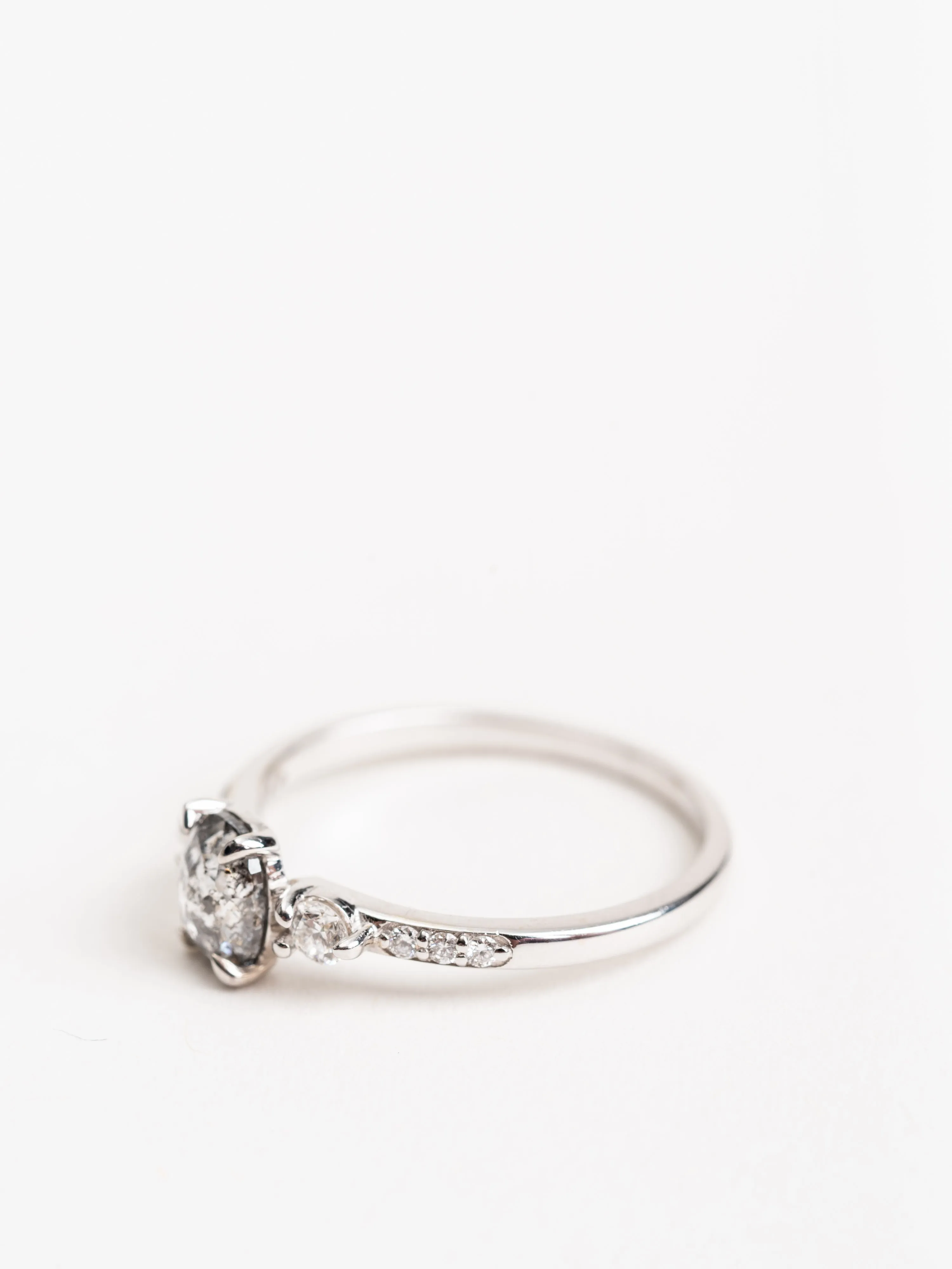 salt & pepper oval diamond with eliza setting