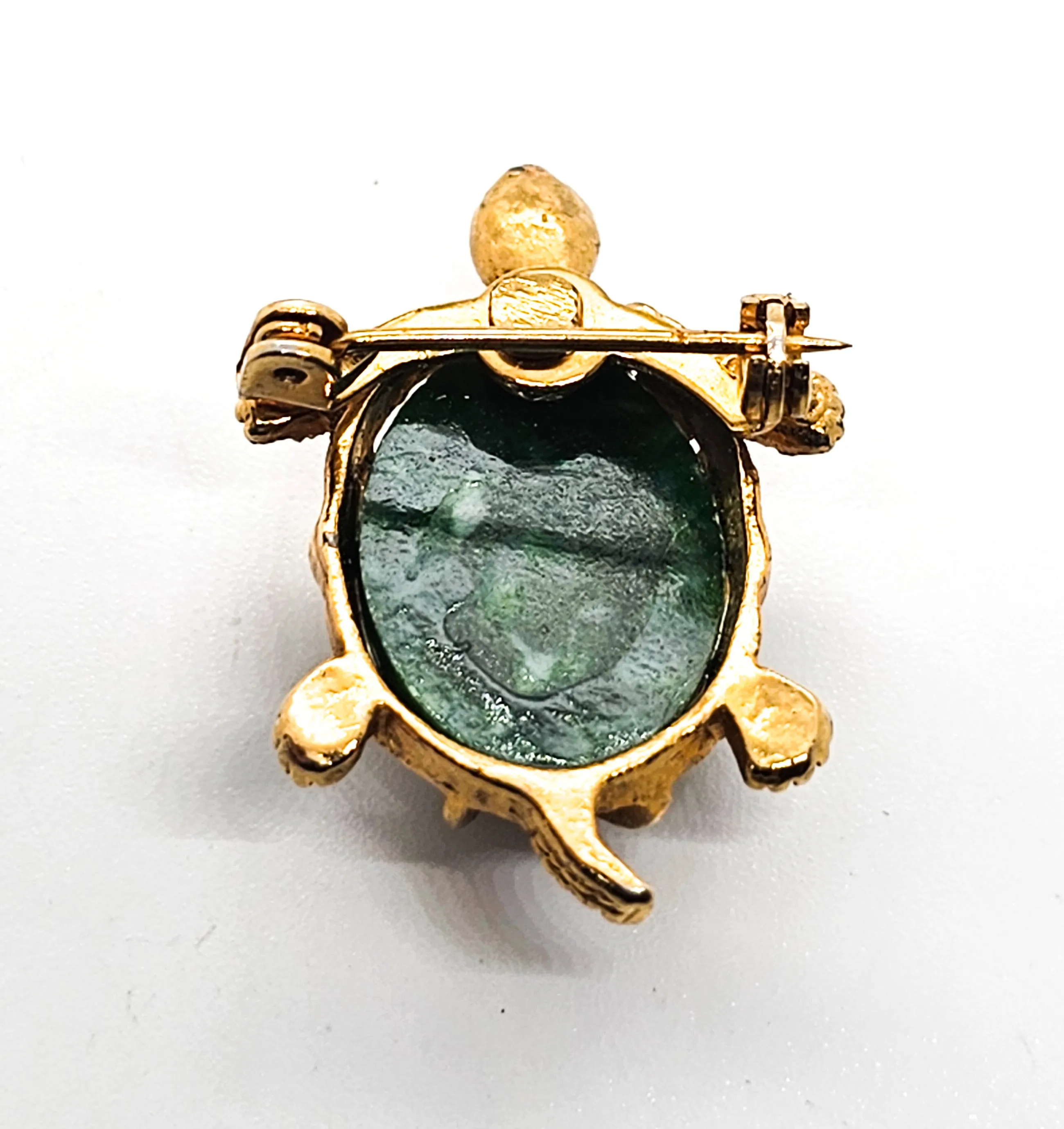 Turtle green lucite and gold toned vintage reptile brooch with red rhinestone eyes